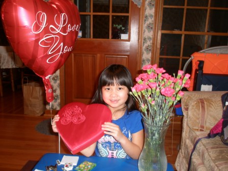 Kasen with her flowers,candy and balloon from Daddy
